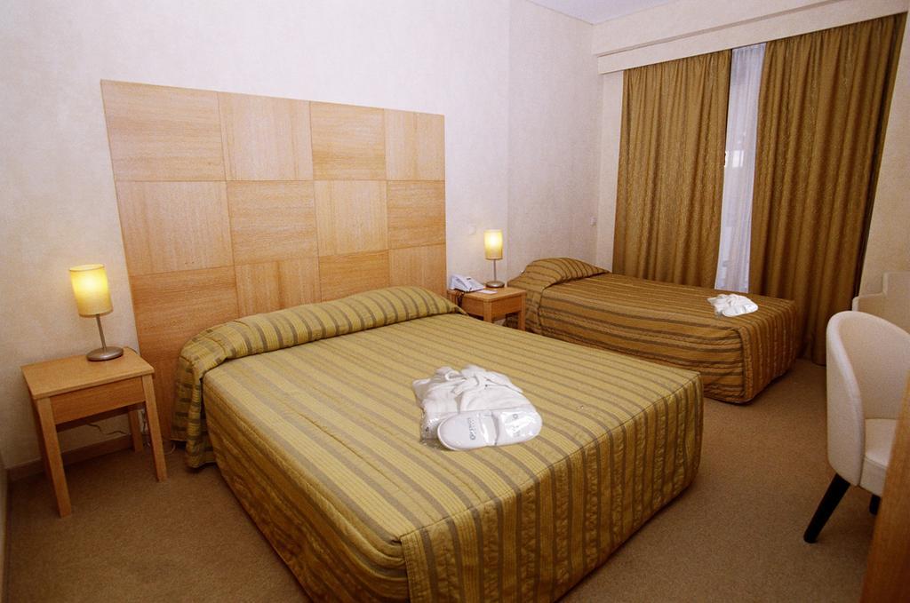 Hotel Lozenge Aten Rum bild