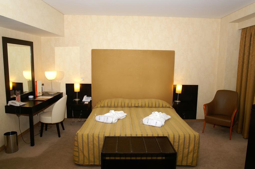 Hotel Lozenge Aten Rum bild